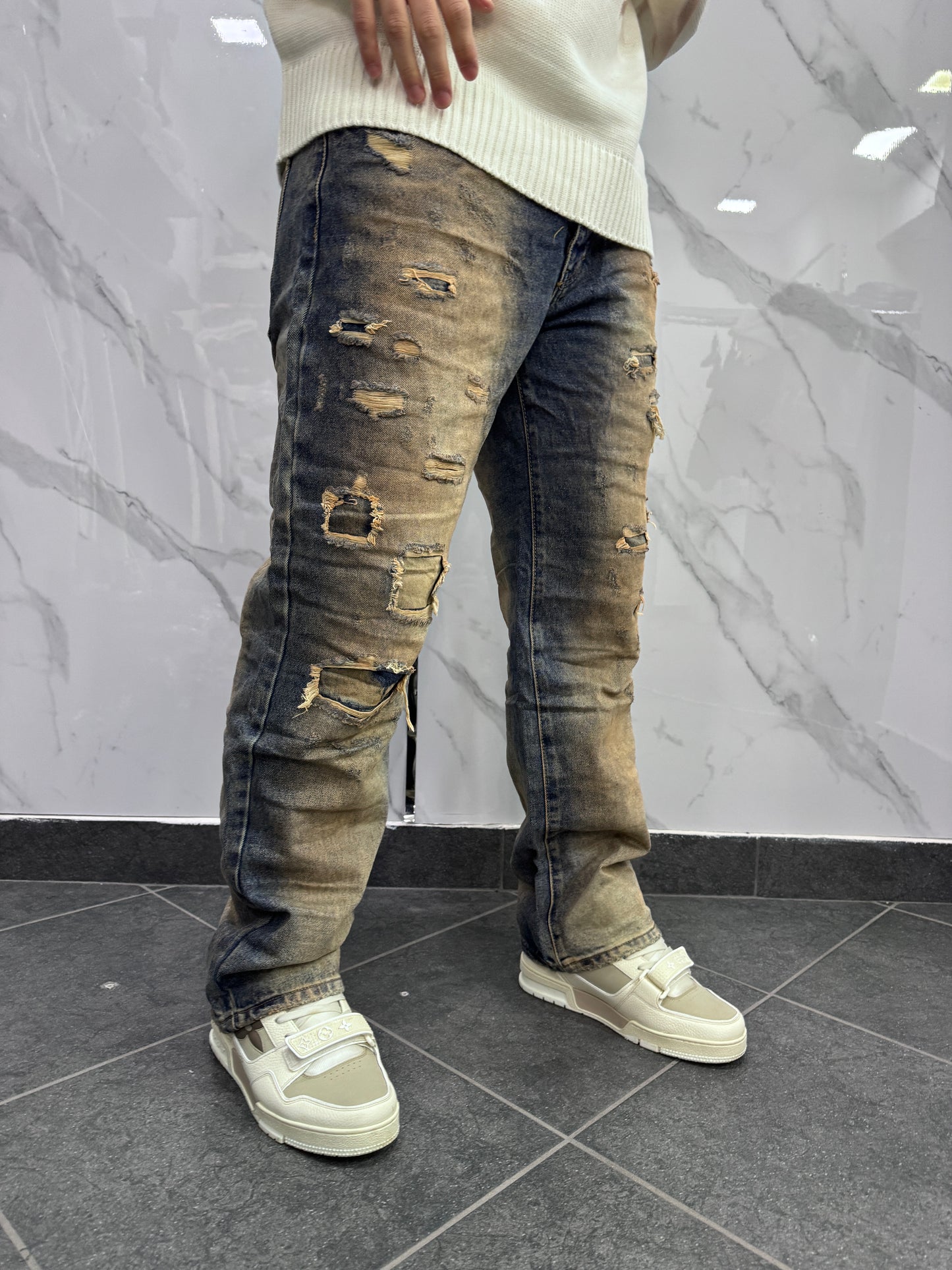 Jeans sabbia rotture