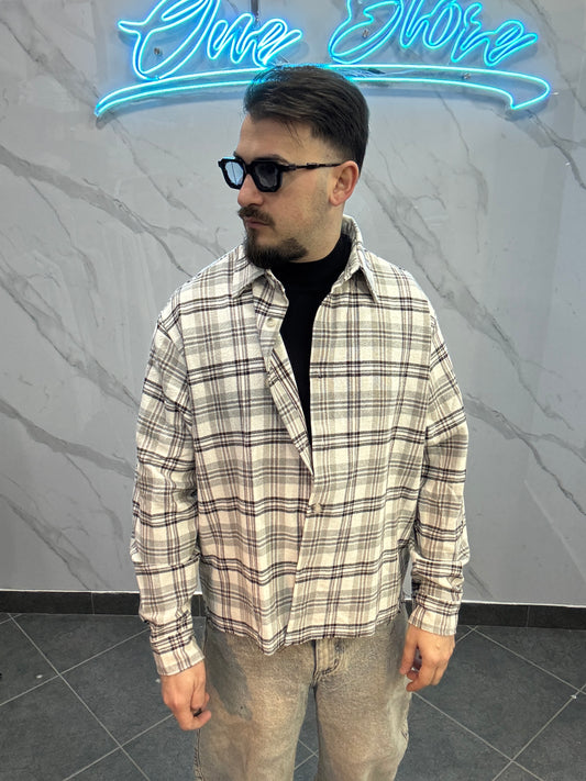 Camicia over sfrangiata bianca